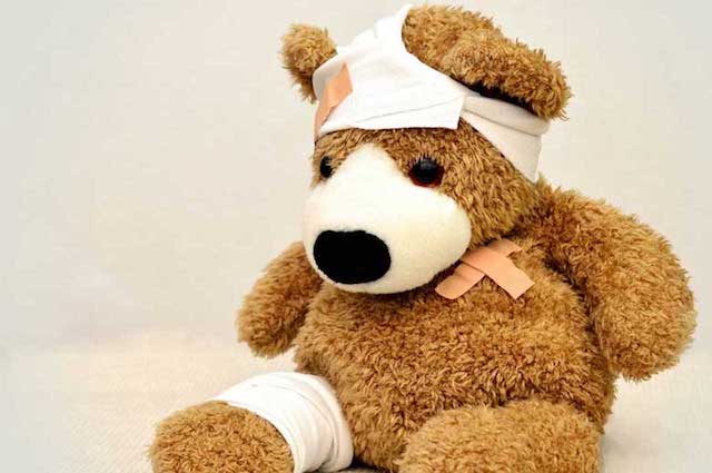 bandaged teddy bear